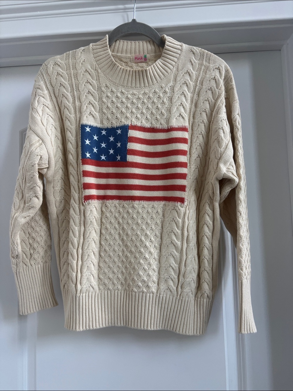Pink Crewneck Cable Knit Sweater in Cream with Flag Motif